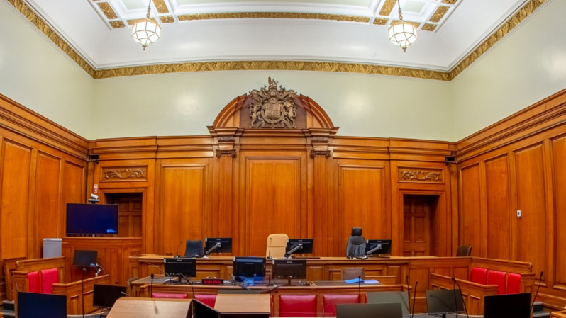 court room scene with ornate celing